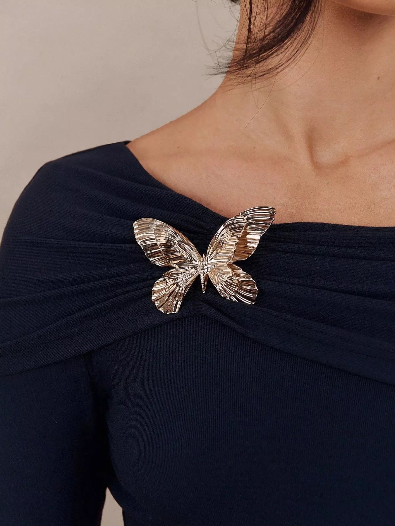 Elegant Off-Shoulder Long Sleeve Top with Butterfly Detail
