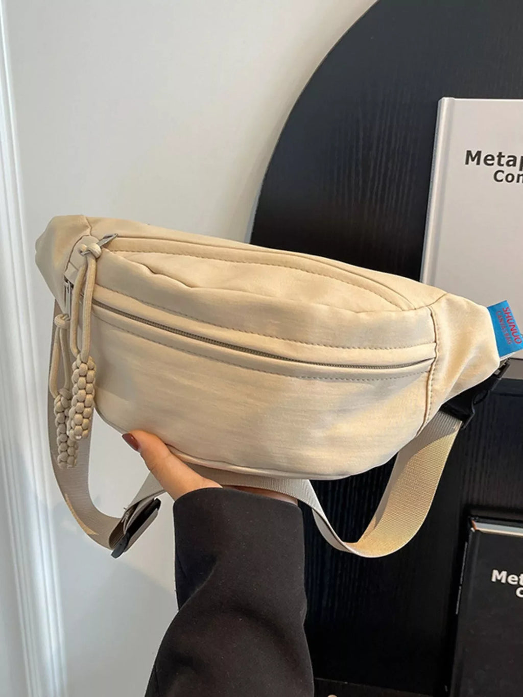 Lightweight Crossbody Bag with Tassel Detail
