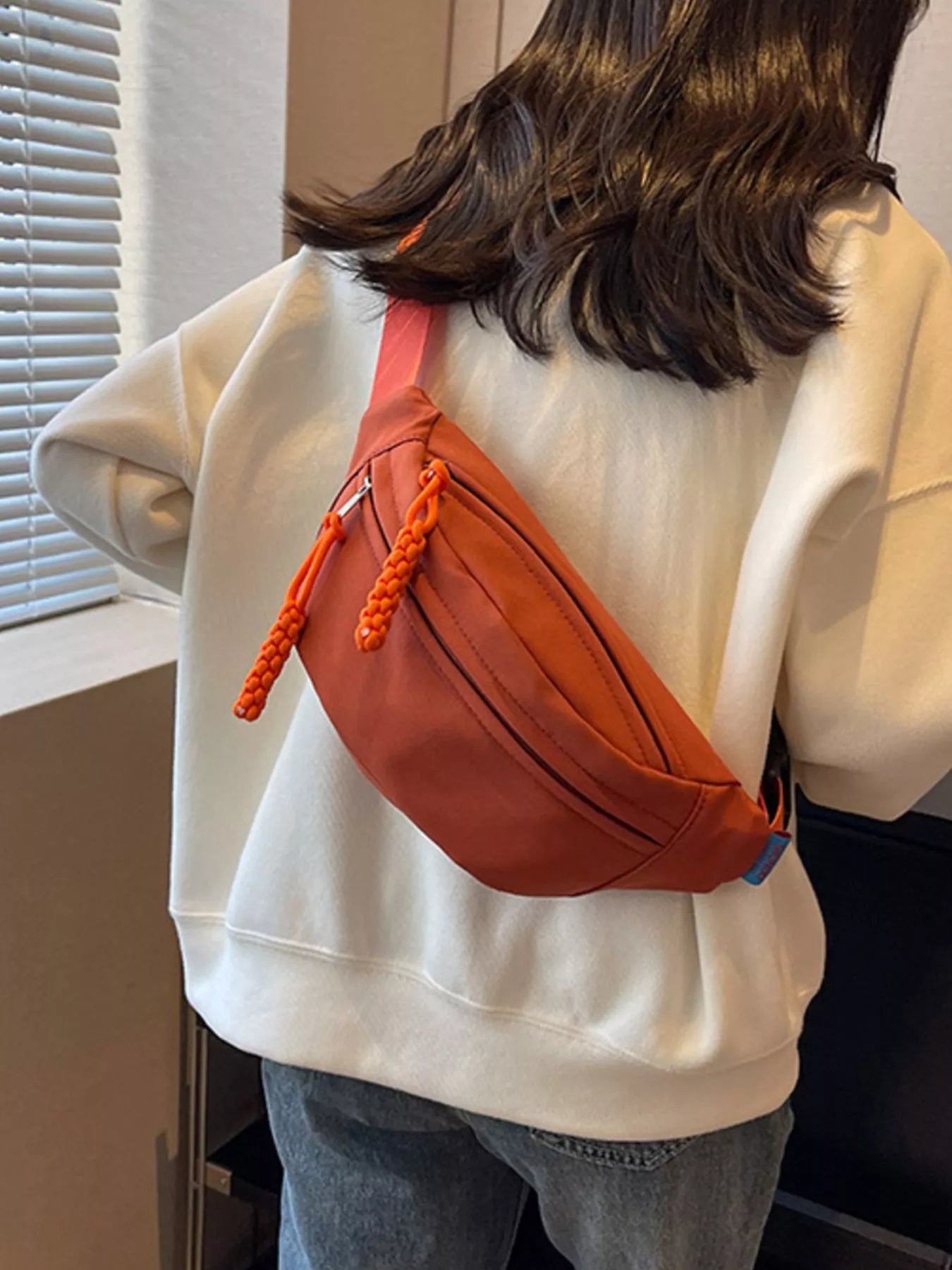 Lightweight Crossbody Bag with Tassel Detail