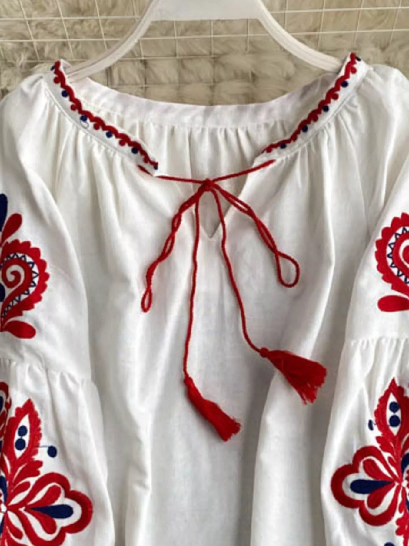 Embroidered Tassel Tie Neck Blouse