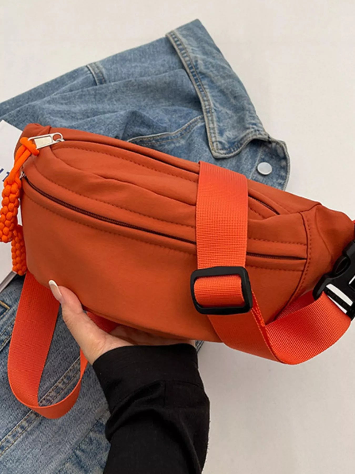 Lightweight Crossbody Bag with Tassel Detail