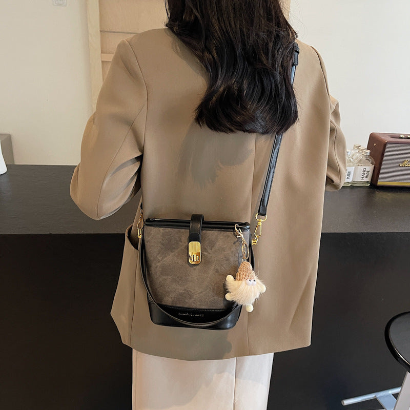 Vintage Bucket Crossbody Bag with Plush Charm