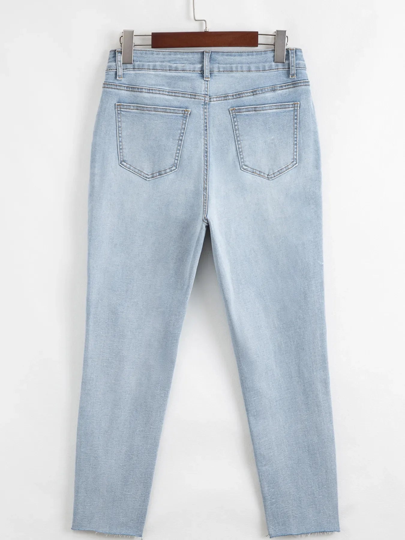 Mid Rise Ankle-Length Distressed Skinny Jeans