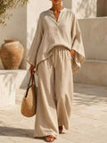 Full Size Notched Long Sleeve Top and Wide-Leg Pants Set Plus Size