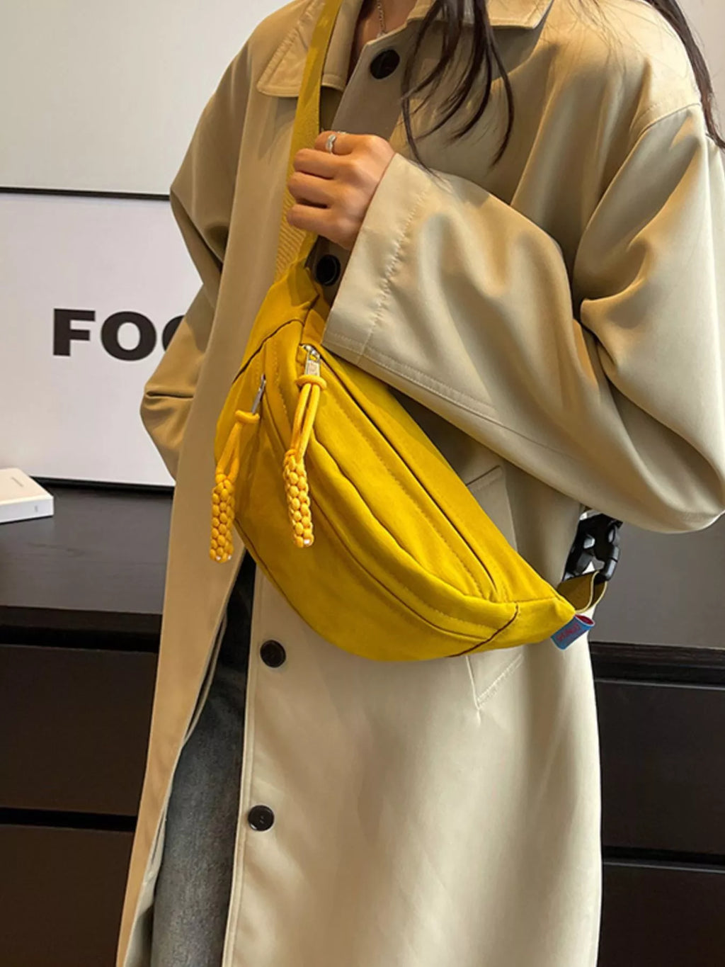 Lightweight Crossbody Bag with Tassel Detail