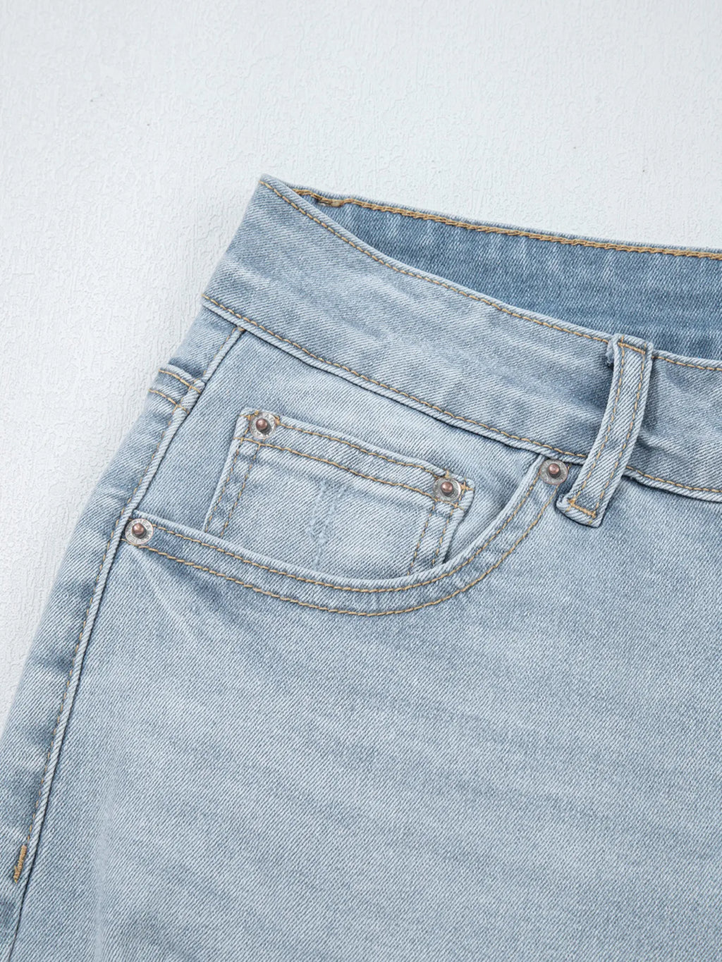Mid Rise Ankle-Length Distressed Skinny Jeans