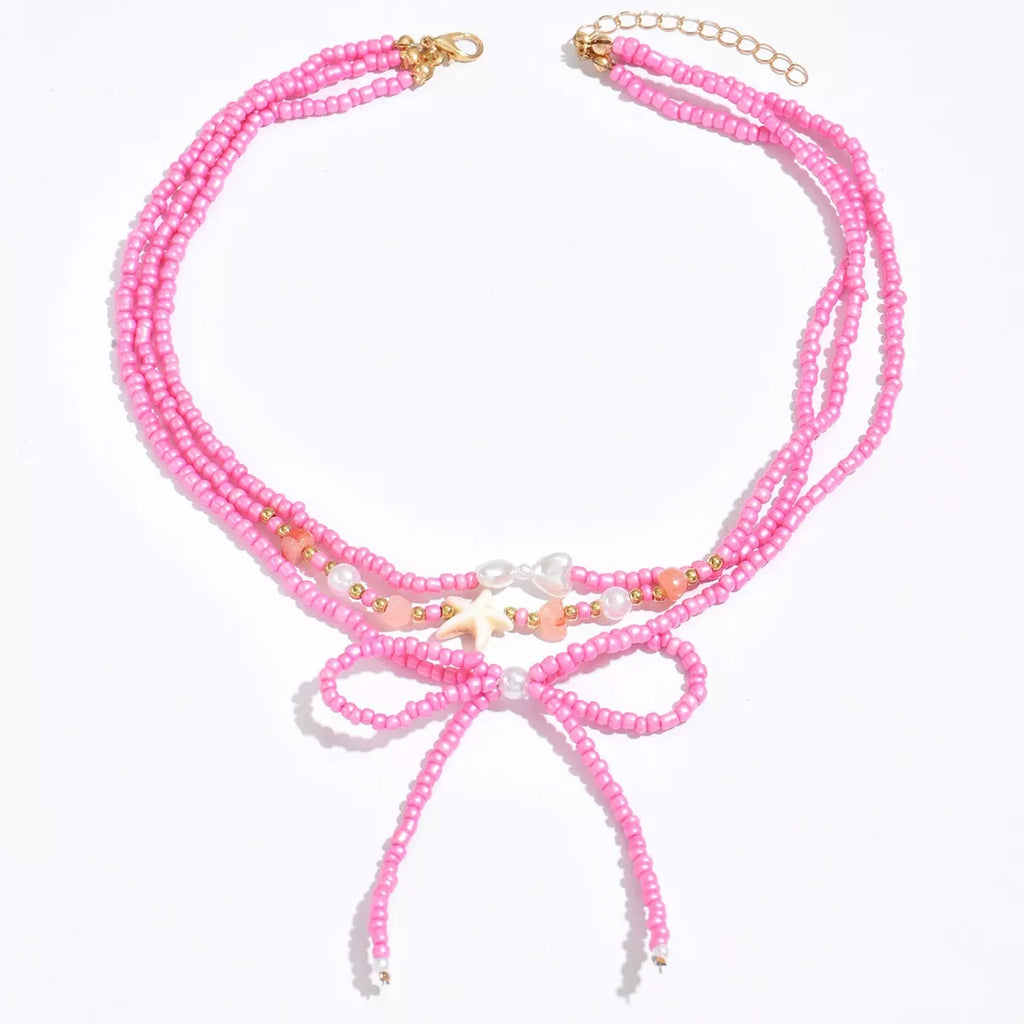Beaded Three-Layered Necklace with Bow and Starfish Charms