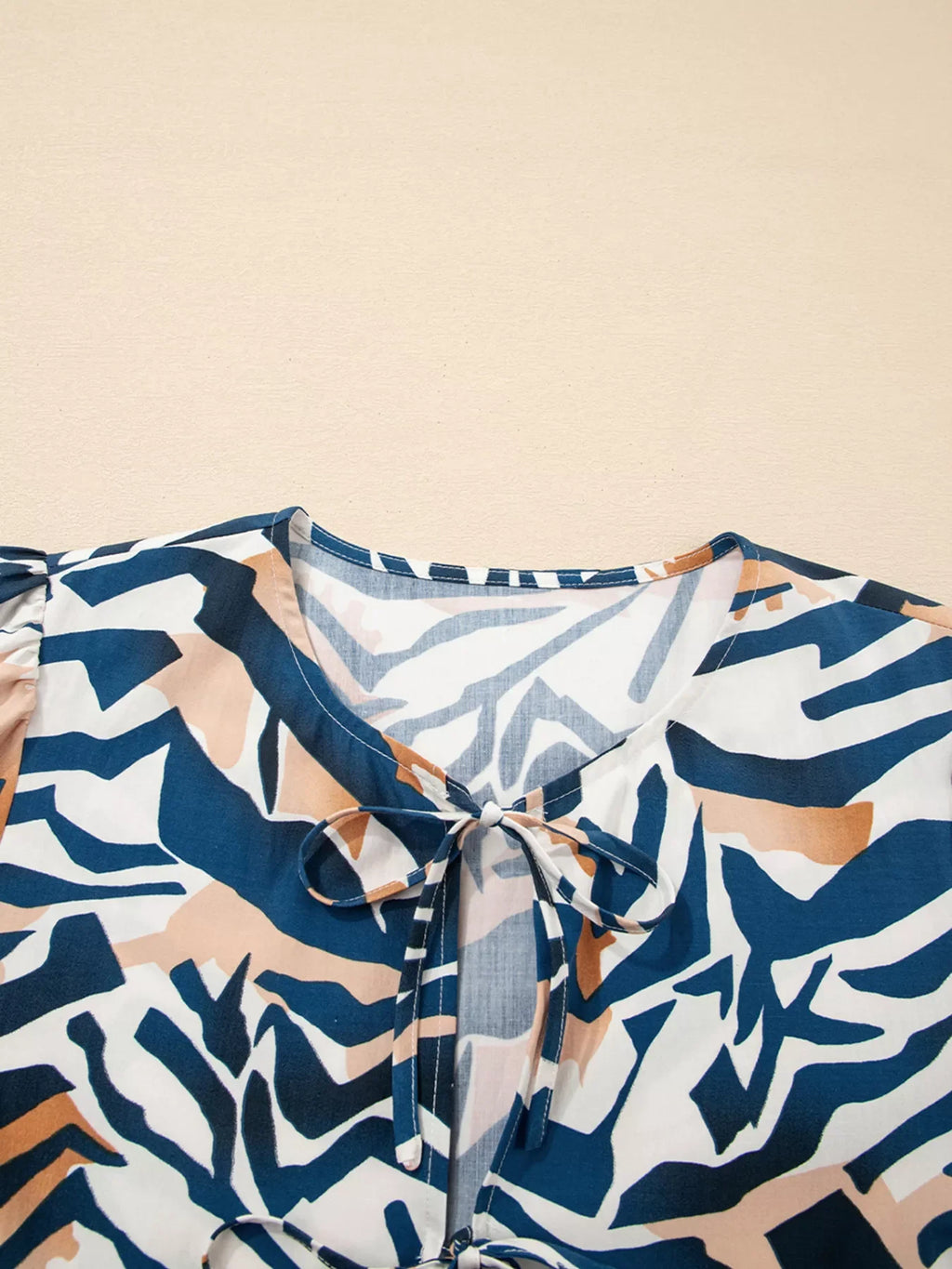 Zebra Print Tied Front Puff Sleeve Top
