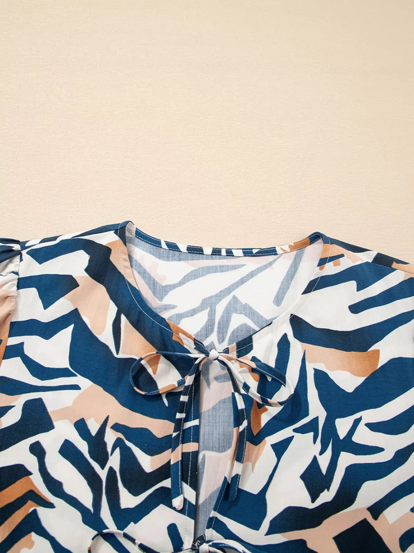Zebra Print Tied Front Puff Sleeve Top