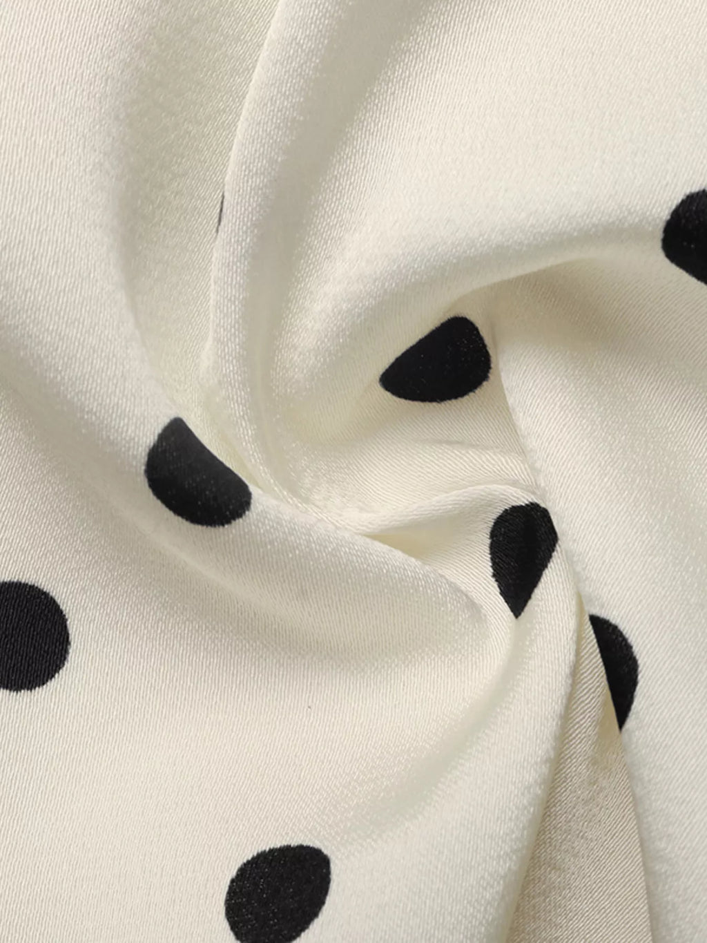 Polka Dot Sleeveless Peplum Blouse