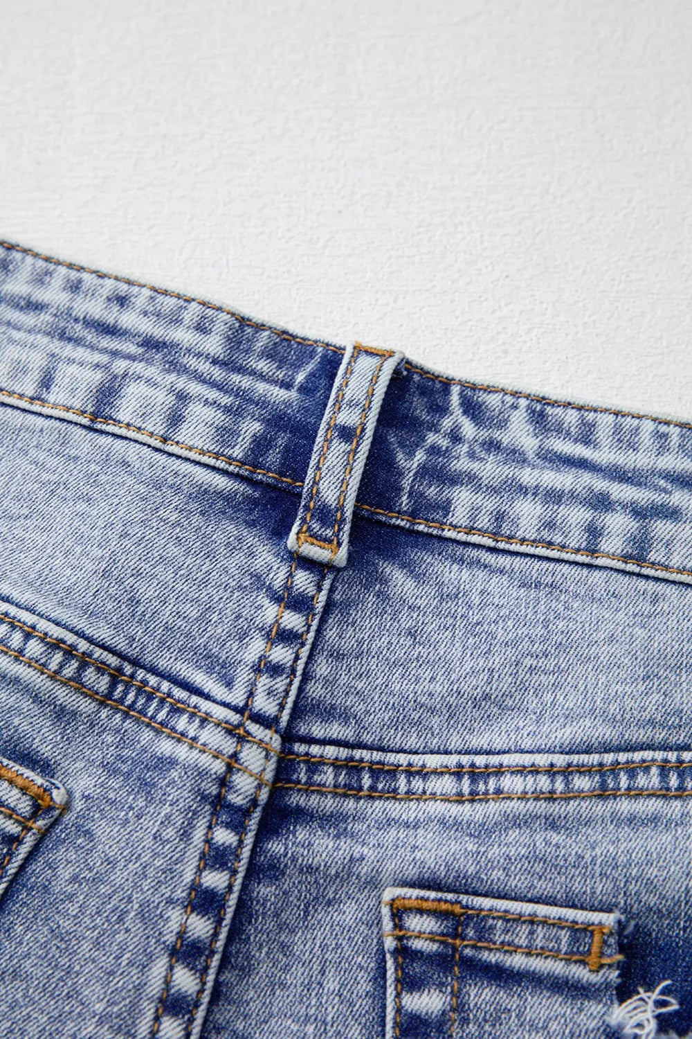 Pearl Studded Pockets Raw Hem Denim Shorts