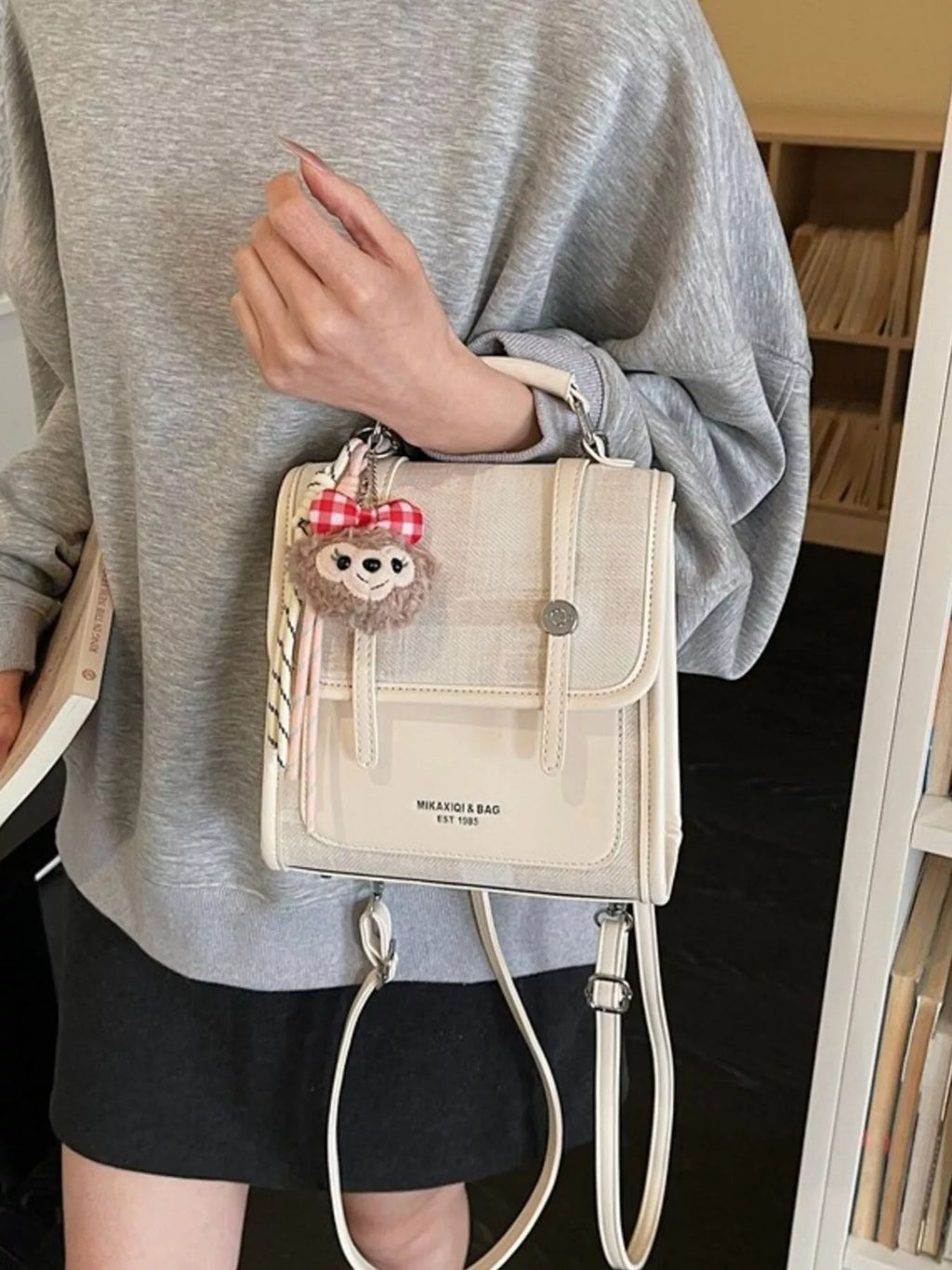 Flap Backpack Bag with Plush Charm