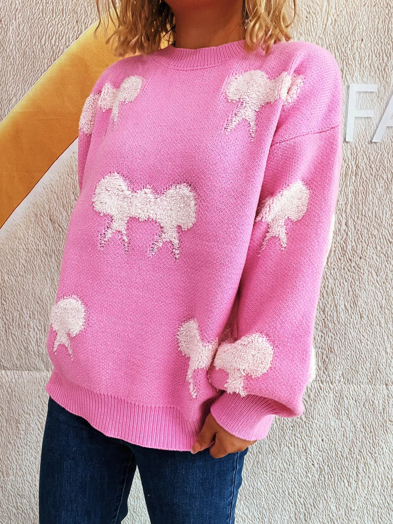Bow Pattern Round Neck Sweater