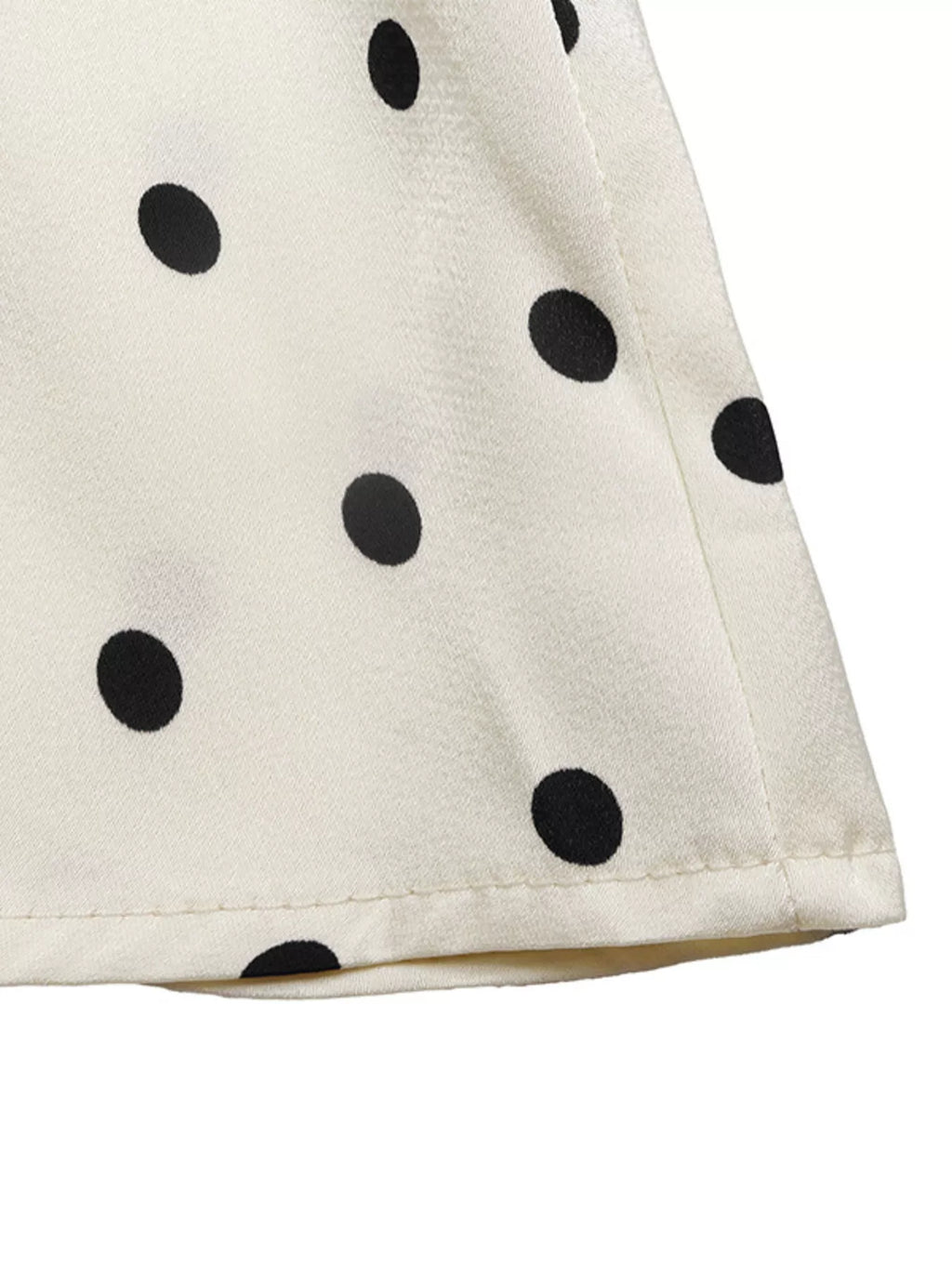 Polka Dot Sleeveless Peplum Blouse