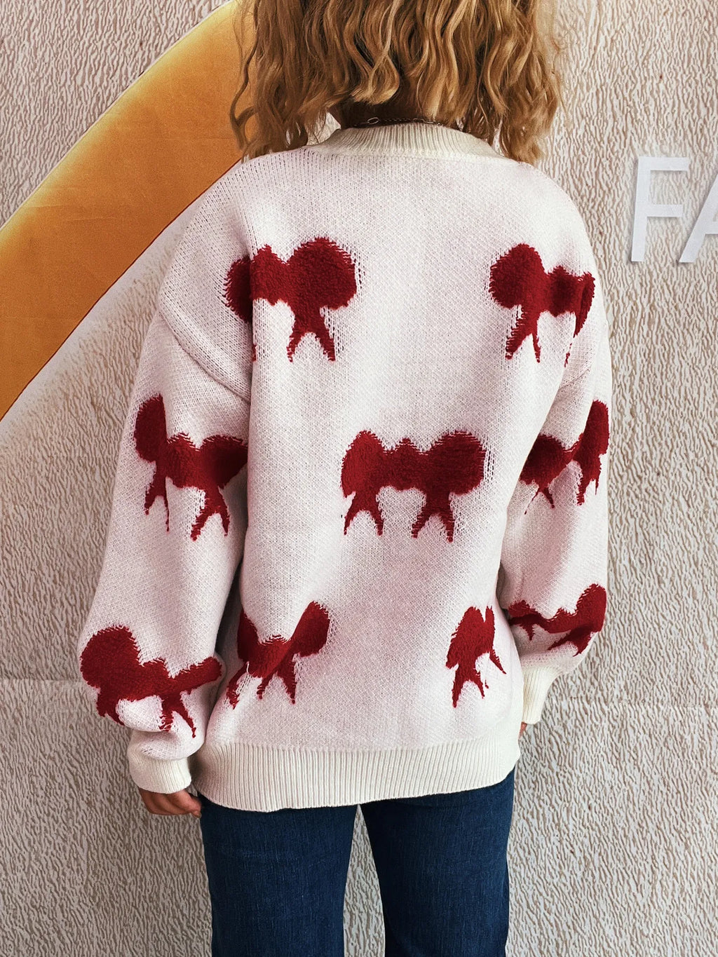 Bow Pattern Round Neck Sweater