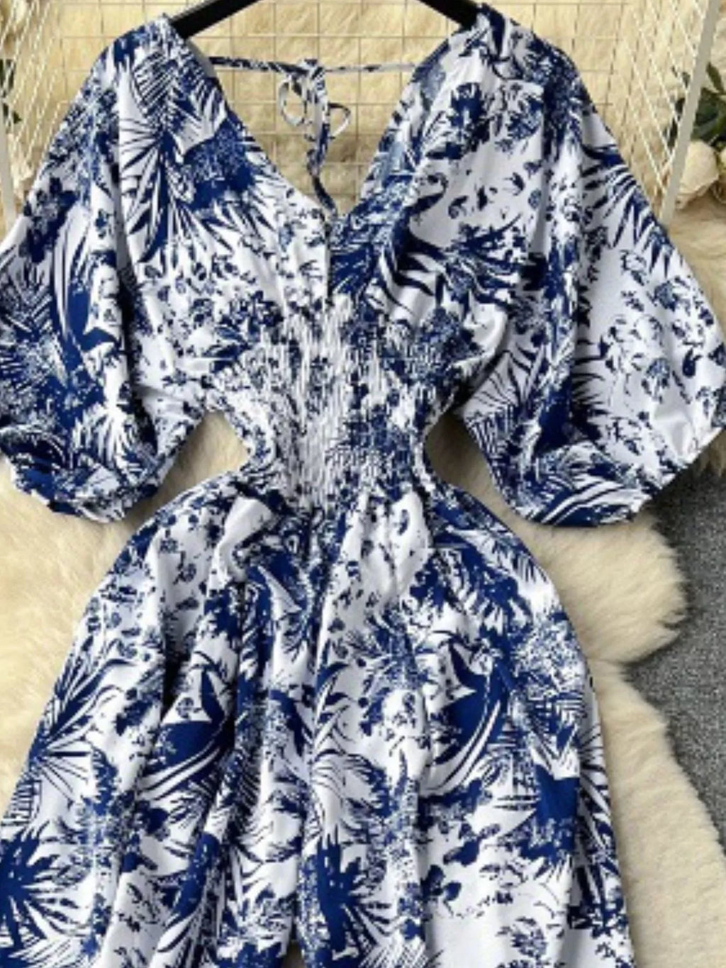 Smocked V-Neck Wide Leg Jumpsuit