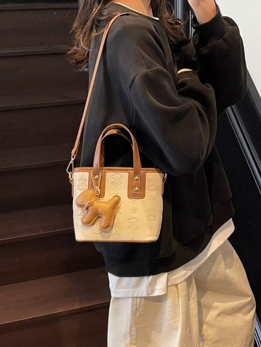 Embossed Pattern Dog Charm Crossbody Bag