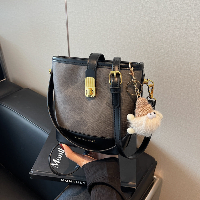 Vintage Bucket Crossbody Bag with Plush Charm