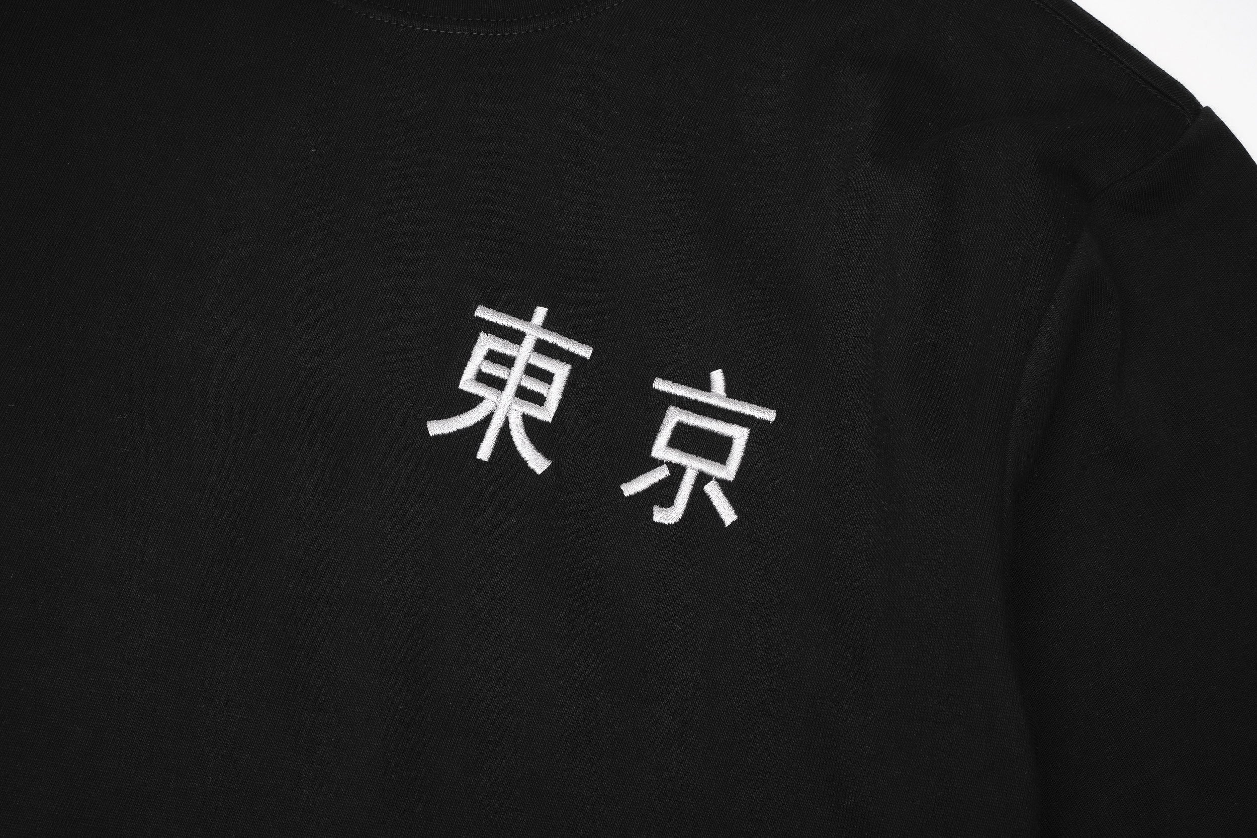 ET9977 War of Beasts Embroidered Tee