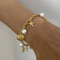 Ocean Theme Stainless Steel Chain Bracelet with Seashell and Starfish Pendants