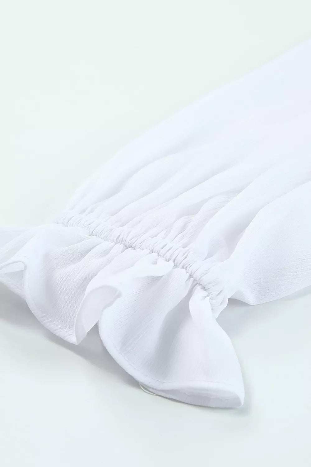 Elegant Tie-Front Ruffle Mini Dress with Smocked Wiast