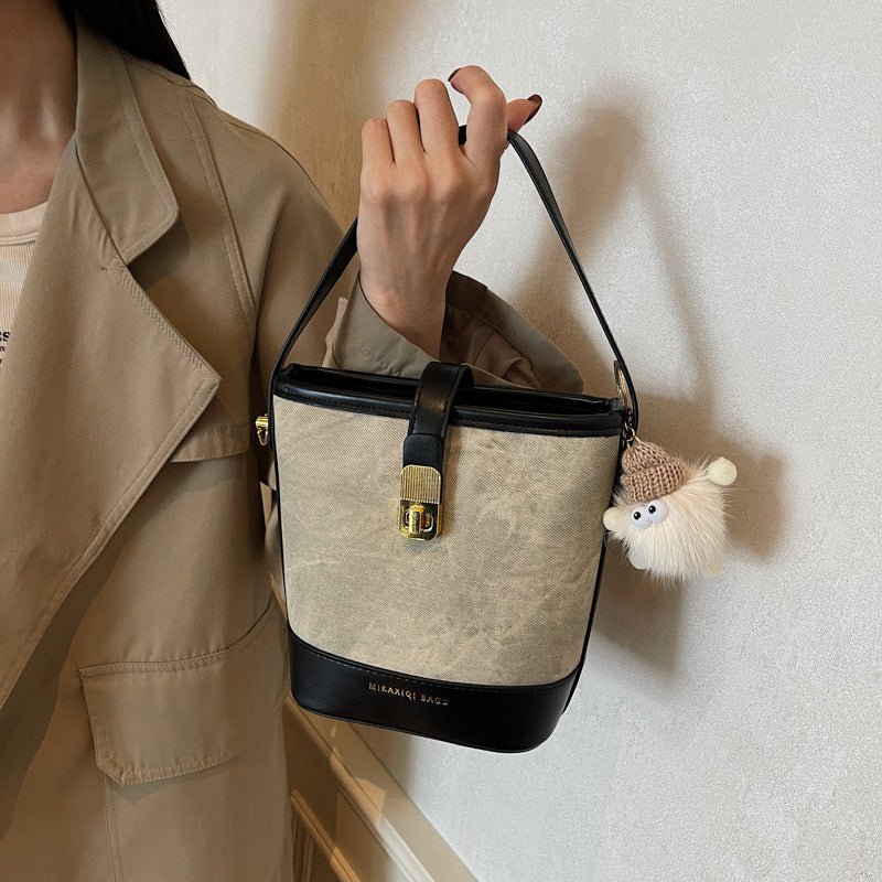 Vintage Bucket Crossbody Bag with Plush Charm