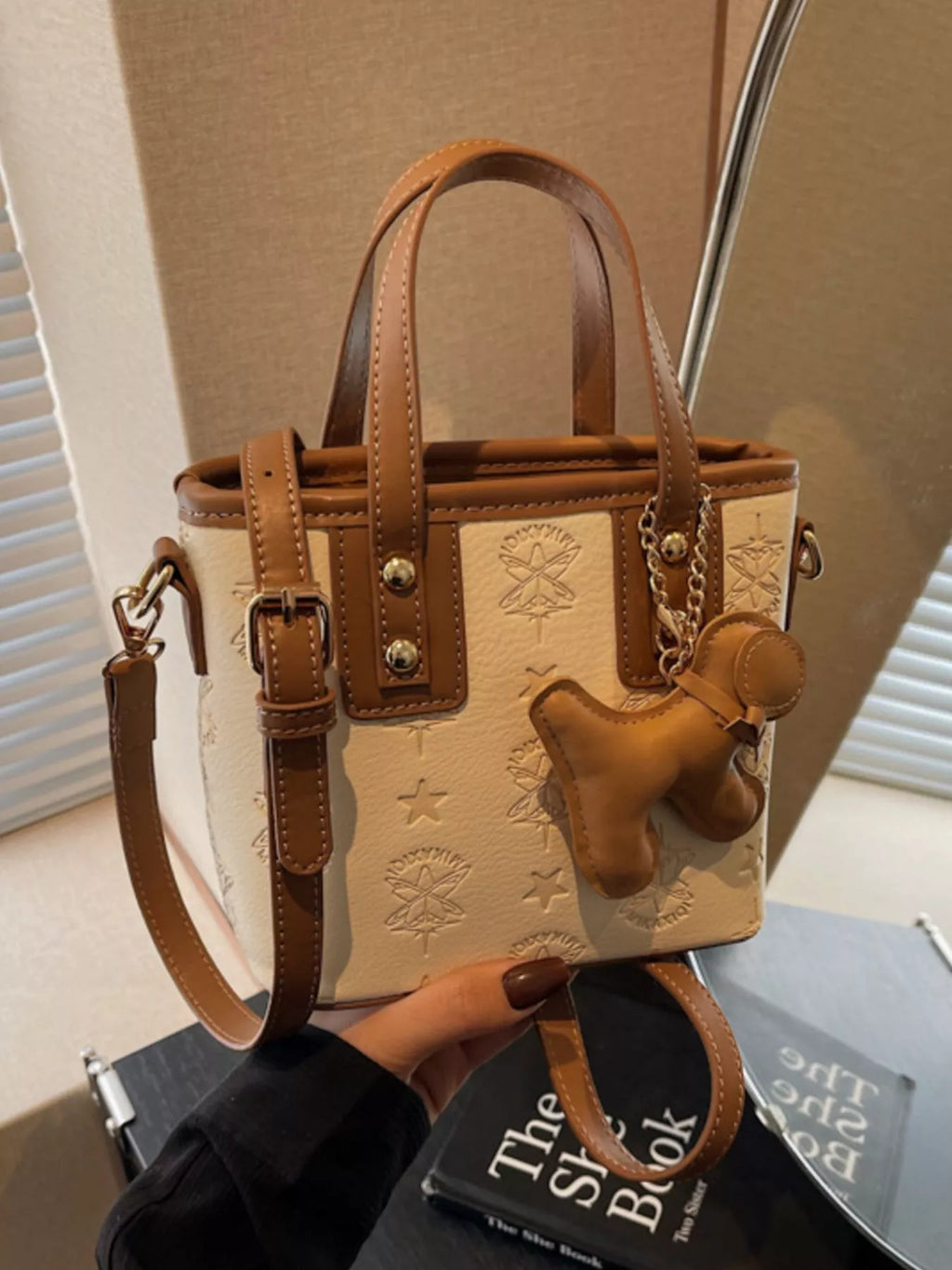 Embossed Pattern Dog Charm Crossbody Bag
