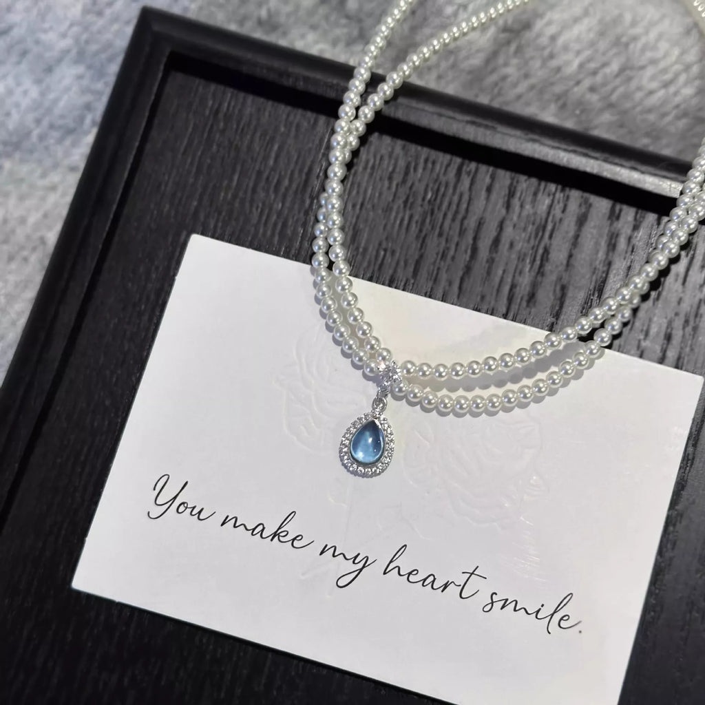 Double Layered Pearl Necklace with Teardrop Pendant