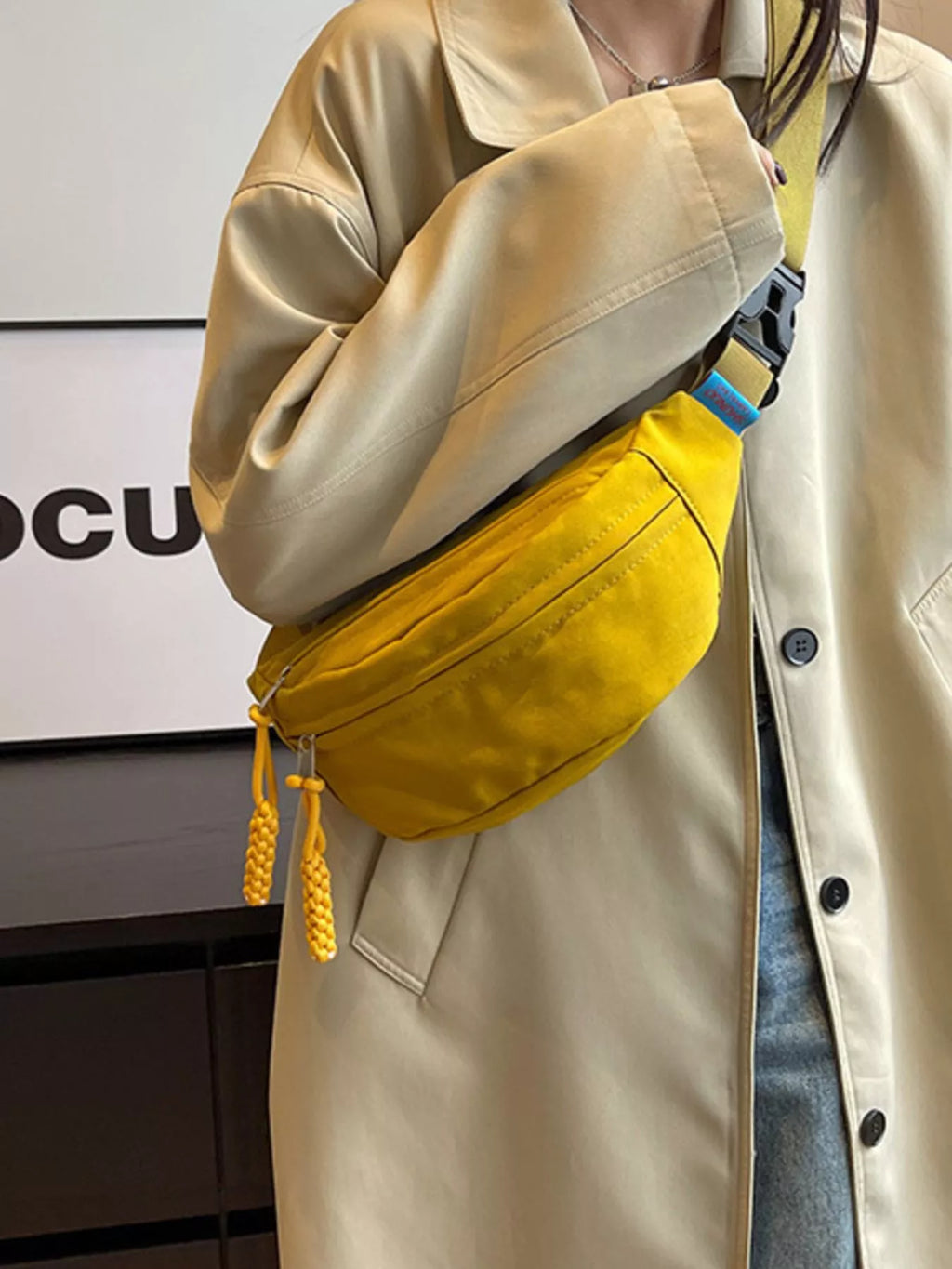 Lightweight Crossbody Bag with Tassel Detail