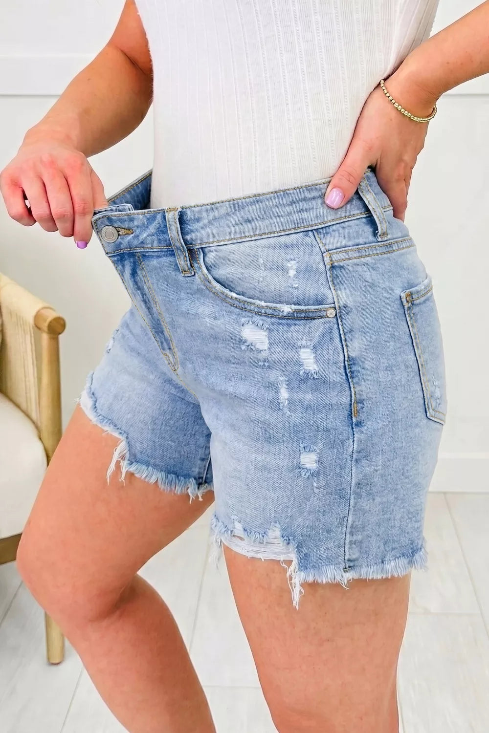 Asymmetric Raw Hem Distressed Whiskery Denim Shorts