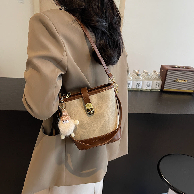 Vintage Bucket Crossbody Bag with Plush Charm